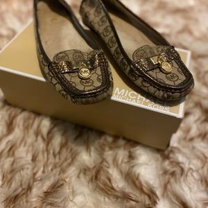 Michael kors gold tone flats in size 8.5